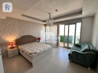 شوقەیەکی یەک ژووری نوستن بە دیمەنە سەرسوڕهێنەرەکانەوە وێنە 4