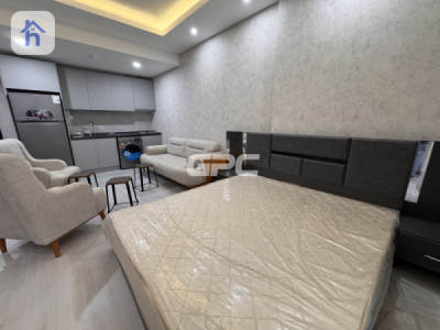 شوقەیەکی ڕاخراو لە کوین تاوەر image 1