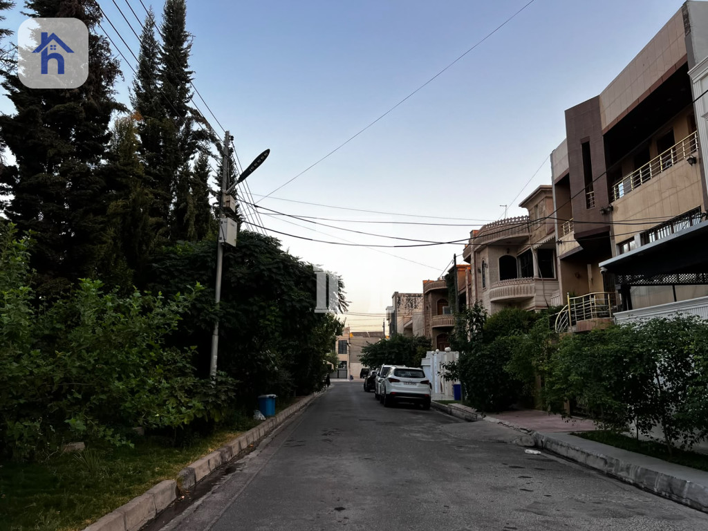 خانوو بەرامبەر باخچە وێنە 2