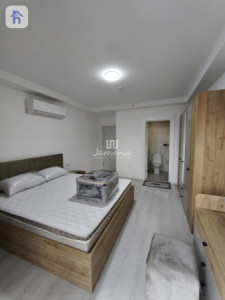 Cozy 2-Bedroom Apartment in Empire Pearl Towers Image 3