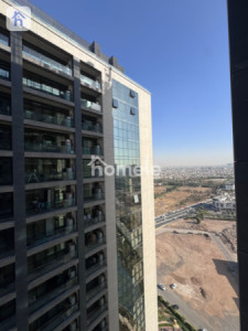 شقة مفروشة حديثة مع إطلالة رائعة image 10