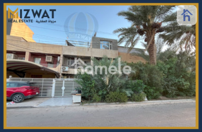 خانوویەکی فراوان لە عەدل، بەغداد image 2