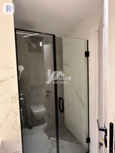 Elegant 4-Bedroom Apartment with Balcony Image 26