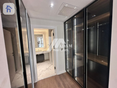 Elegant 4-Bedroom Apartment with Balcony Image 13