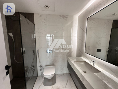 Elegant 2-BR Apartment with Terrace Image 12