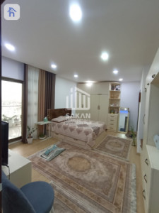 شوقەیەکی مۆدێرن لە یەک ژووری نوستن وێنە 5