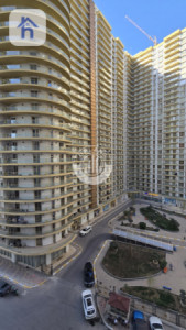 شوقەیەکی مۆدێرن یەک ژووری نوستن لە ڕامی تاوەر وێنە 14