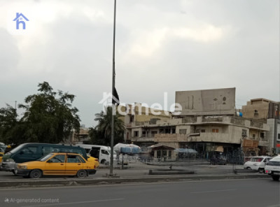 Corner Commercial Building at Land Price image 1