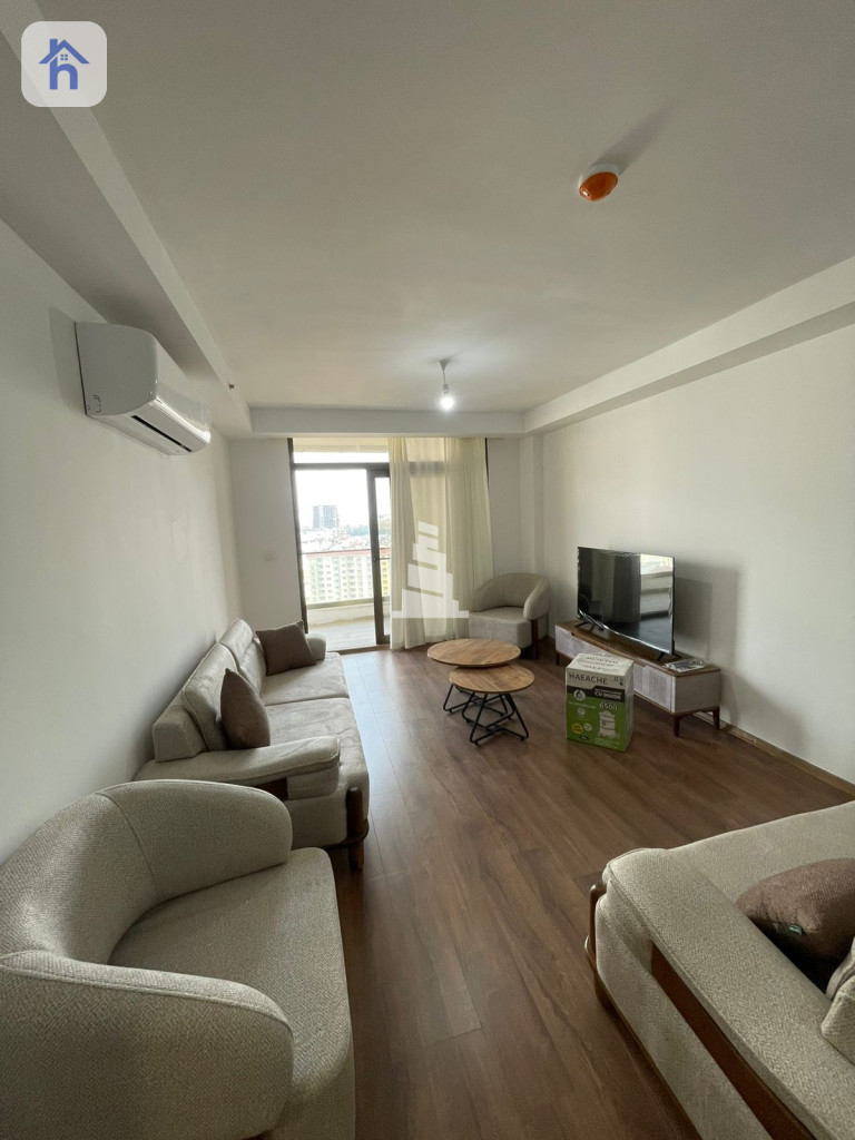 شوقەیەکی ڕاخراو لە ئیمپایەر پیرڵ تاوەرز