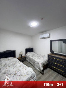 شوقەیەکی مۆدێرن و ڕاخراو لەگەڵ دیمەنی شار image 7