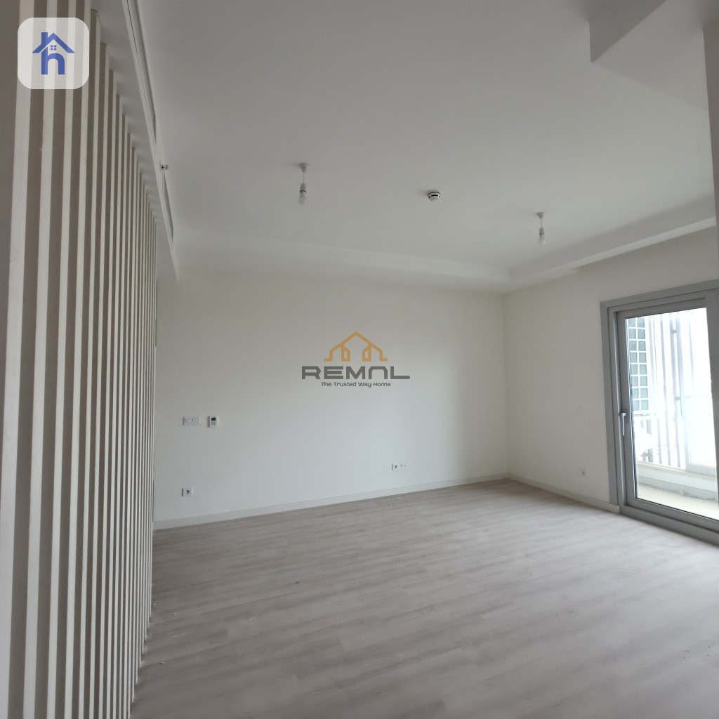 A 2+1 outside view apartment for sale in Empire Square Resim 2