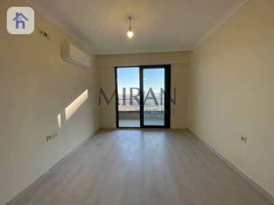 شوقەیەکی ئارام لەگەڵ ژووری میوانێکی فراوان image 1