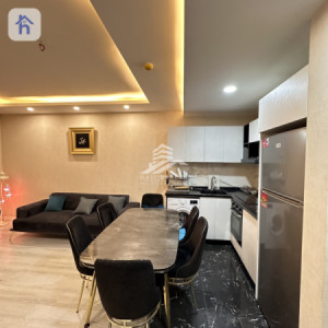 شوقەیەکی مۆدێرن بۆ یەک ژووری نوستن لە هەولێر وێنە 3