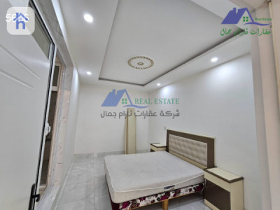 خانوویەکی ئارام بە یەک ژووری نووستن لە هەولێر image 7
