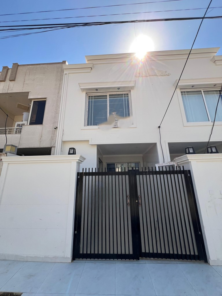 House Opposite Garden