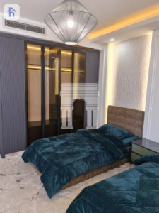 شوقەیەکی فراوانی دوو ژووری نوستن وێنە 6