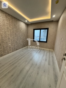شوقەیەکی ڕووناک لە دوو ژووری نوستن وێنە 3