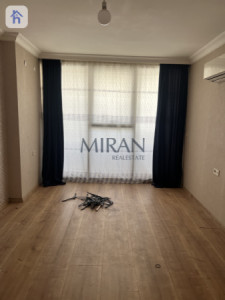شوقەیەکی ئارام لە یەک ژووری نوستن image 2