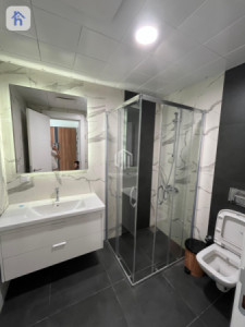 Cosy 1BR Apartment in Empire Wings Resim 6