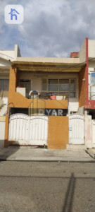 خانوویەکی بچووک لە کارێزان image 1