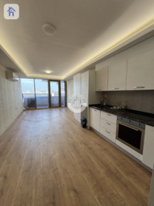 شوقەیەکی مۆدێرن بە یەک ژووری نوستن image 1