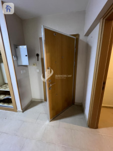 شوقەیەکی یەک ژووری نوستن لە جیهان ستی وێنە 5