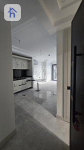 شوقەیەکی مۆدێرن یەک ژووری نوستن لە ڕامی تاوەر image 2