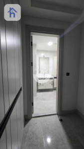 شوقەیەکی مۆدێرن یەک ژووری نوستن لە ڕامی تاوەر وێنە 8