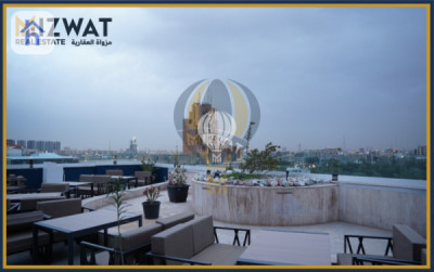 بینای بازرگانی لە جادریە وێنە 6