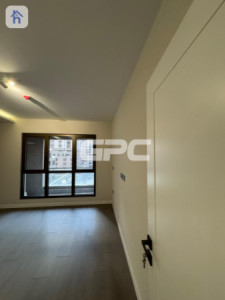 شوقەیەکی مۆدێرن بۆ یەک ژووری نوستن لە هەولێر image 2