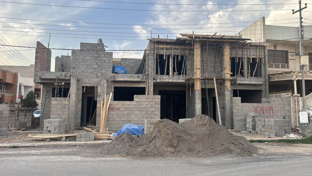 Two Houses Under Construction