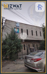 بینای بازرگانی لە بەغدا، بەیاع وێنە 3