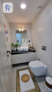 شقة عصرية بثلاث غرف نوم صورة 10