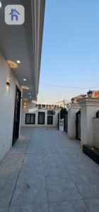 خانوویەکی فراوان بە دیزاینێکی مۆدێرن وێنە 14