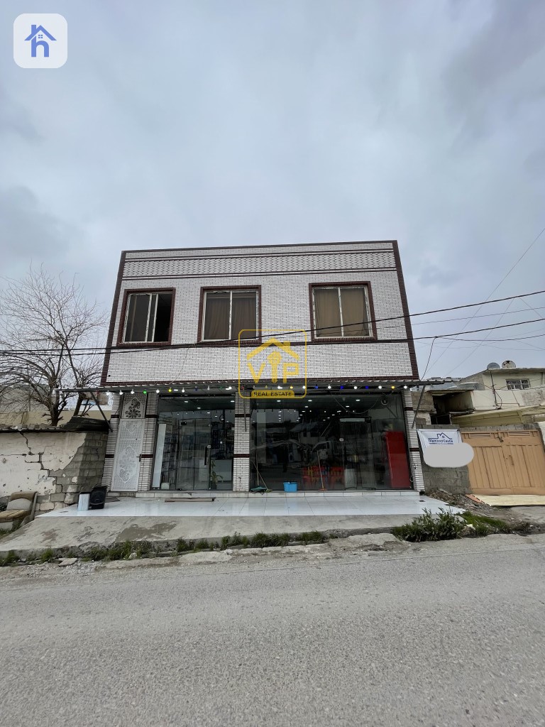 Two-story commercial building in Pirzin