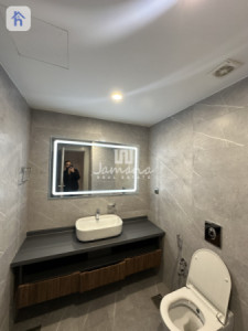 Elegant 1-Bedroom Apartment in Sky Towers Resim 5